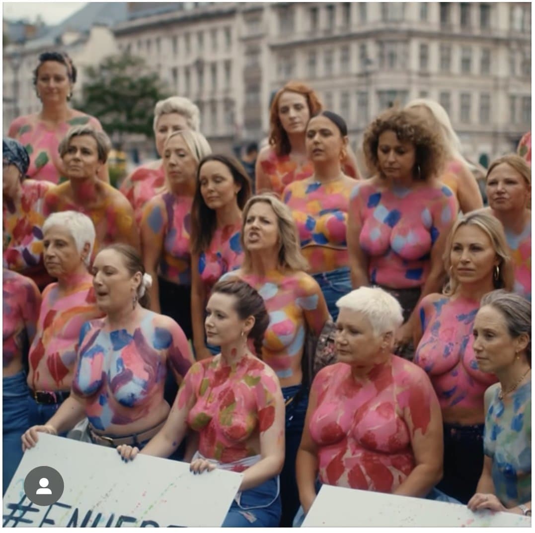 Click to view full size Sophie and friends topless cancer protest