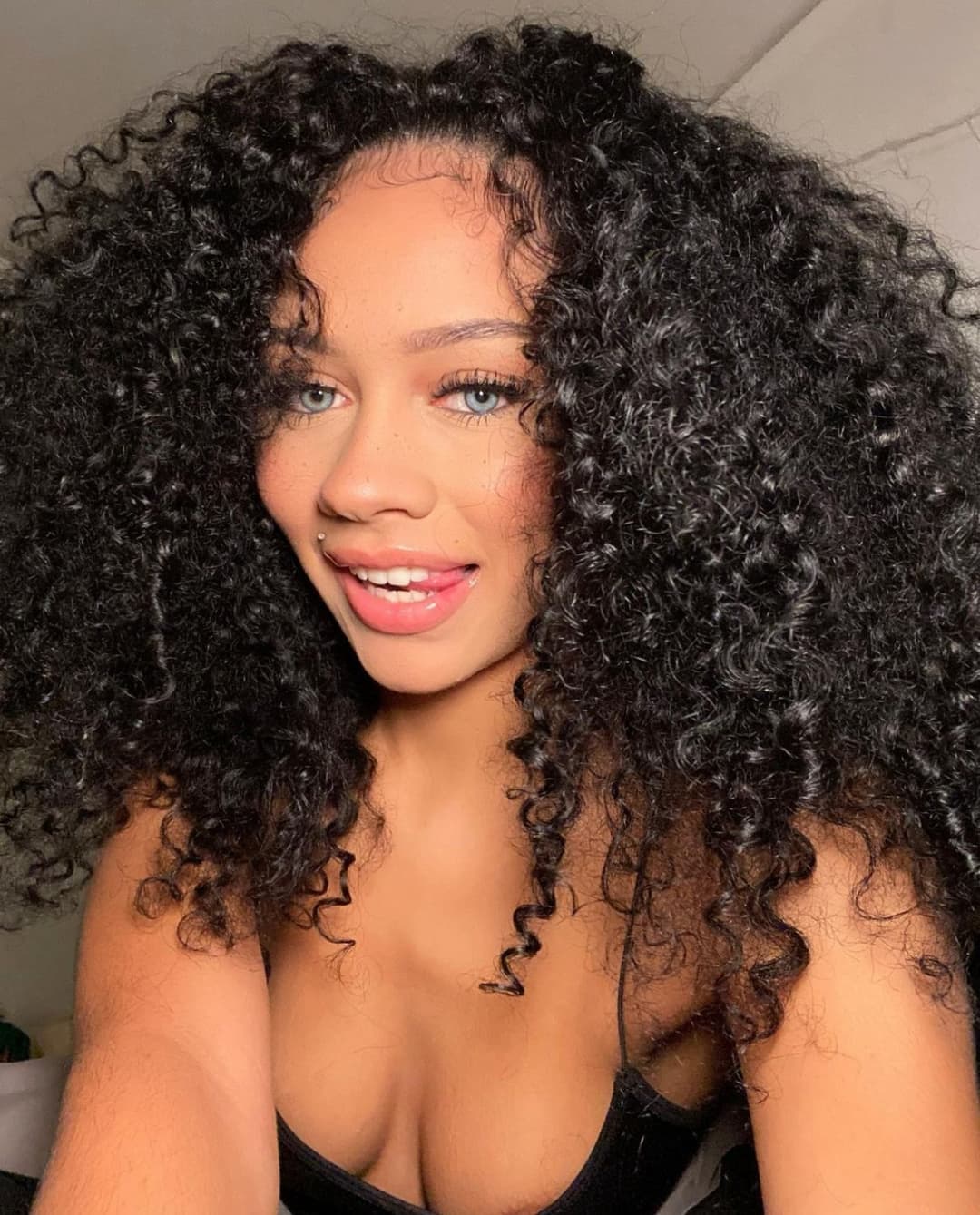 Click to view full size Cutie Camille shows off exotic features