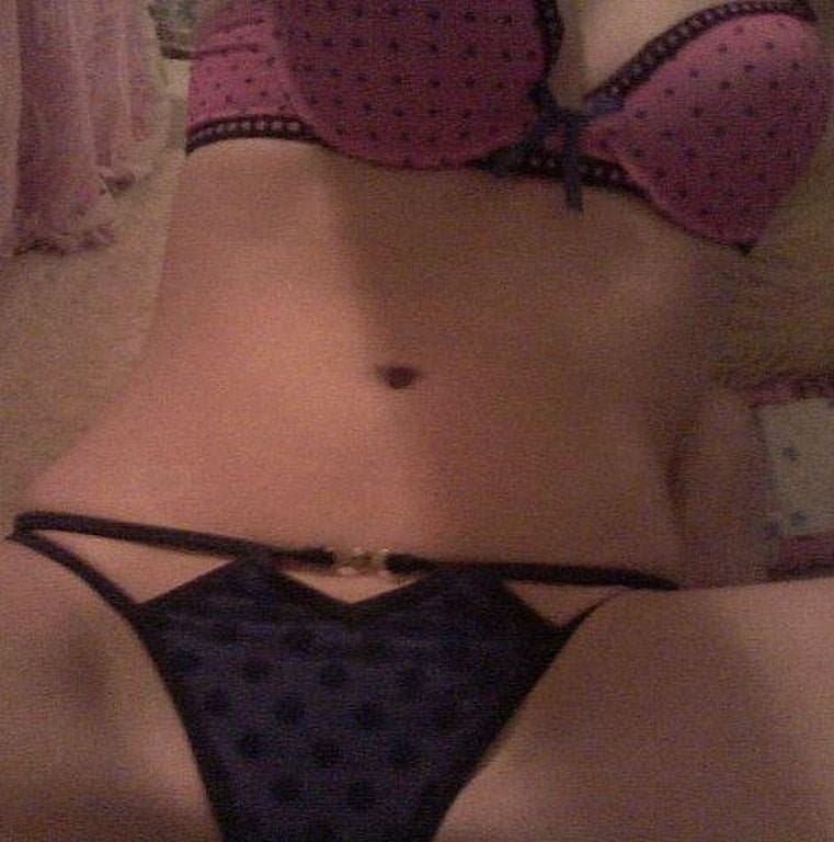 Click to view full size Naughty girl showing herself in lingeries