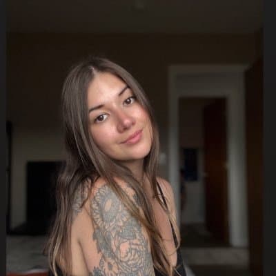 Click to view full size Hottest Milf ever? This curvy slut who loves sticking her tongue out comes damn close