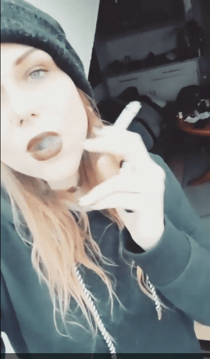 smoking hot emo hipster goth girl fucks the guys in the band. I love when women smile and smoke.