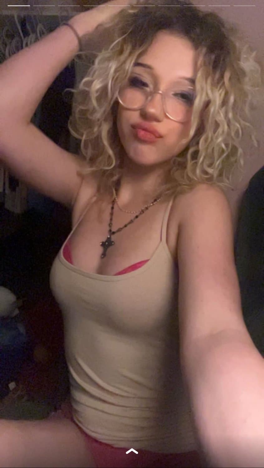 pink haired emo girl arches and shows ass