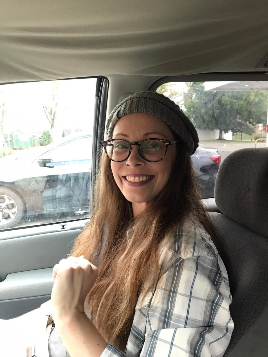 Click to view full size Tricia sneaks off to give a quick look at her titties