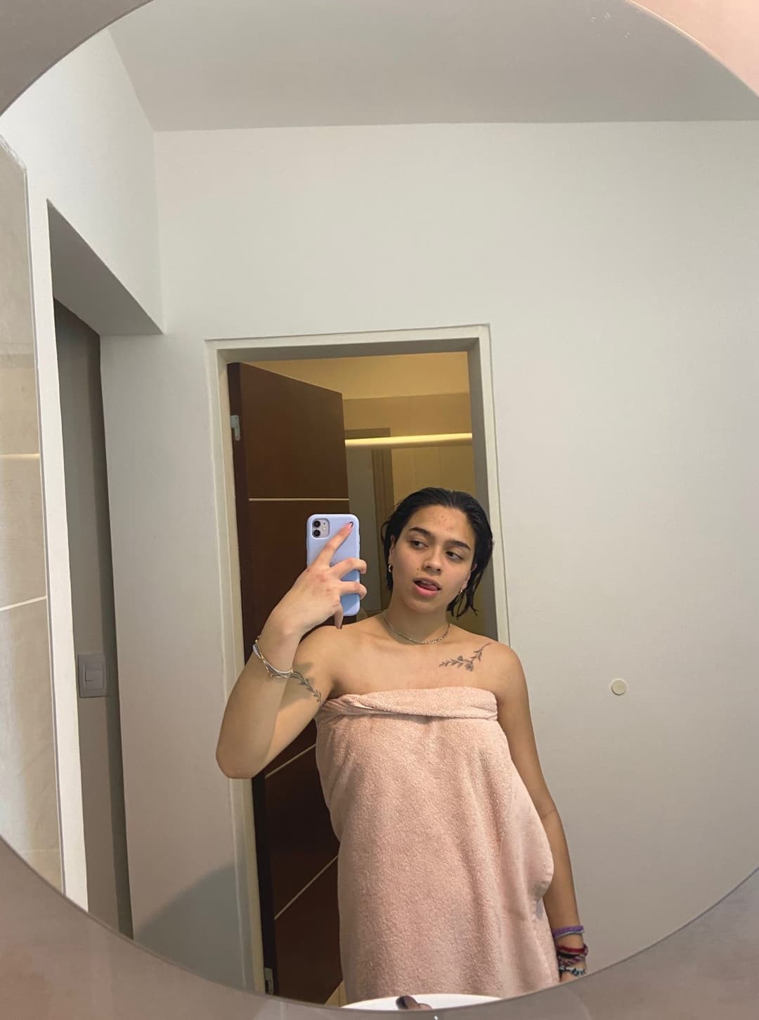 Who knows how long til this towel slips off of me