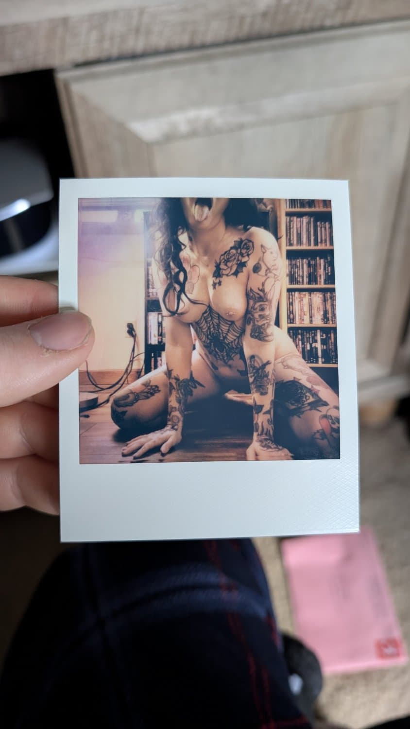 Well well well.....A nude polaroid photo of the tatted Slut Amanda Ferg/Franken Ferg. Great titties.