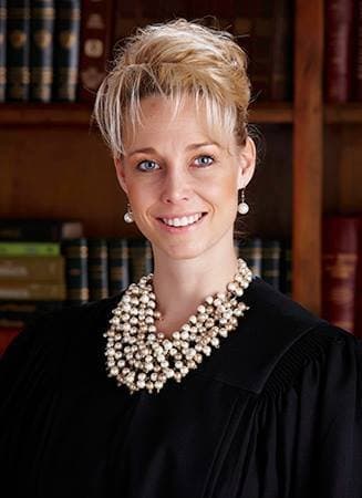 Cast your vote for the best tits at Mardi Gras from this busty j u d g e!