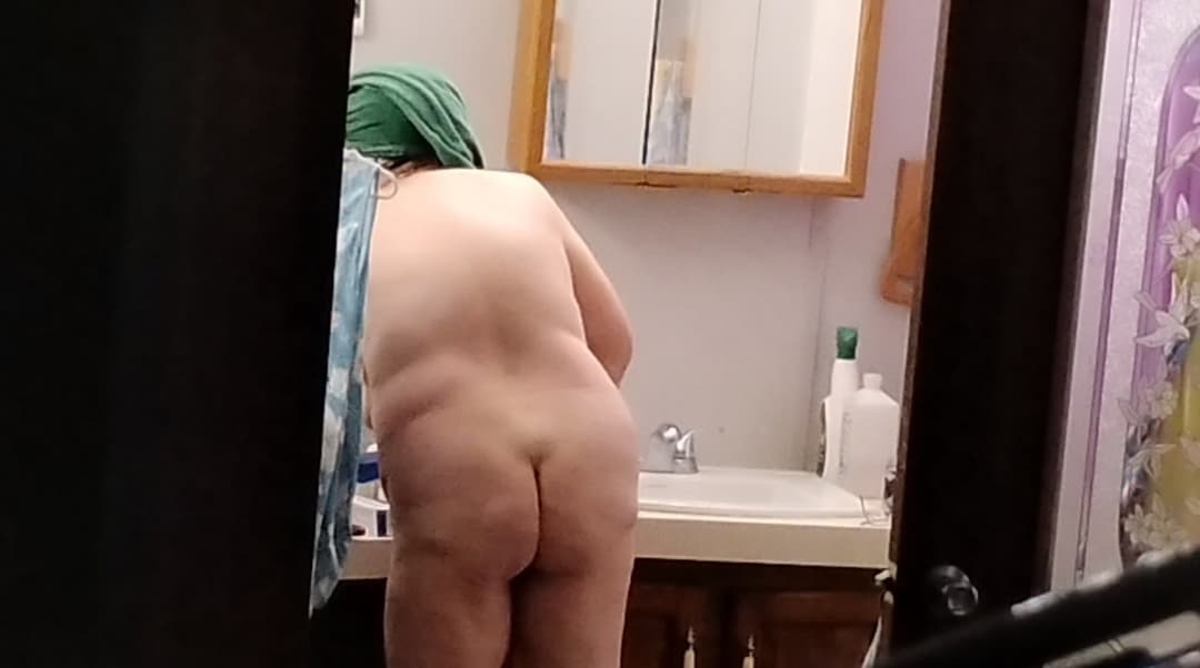 Peeking at my 60-year-old mother getting dressed after taking a shower.