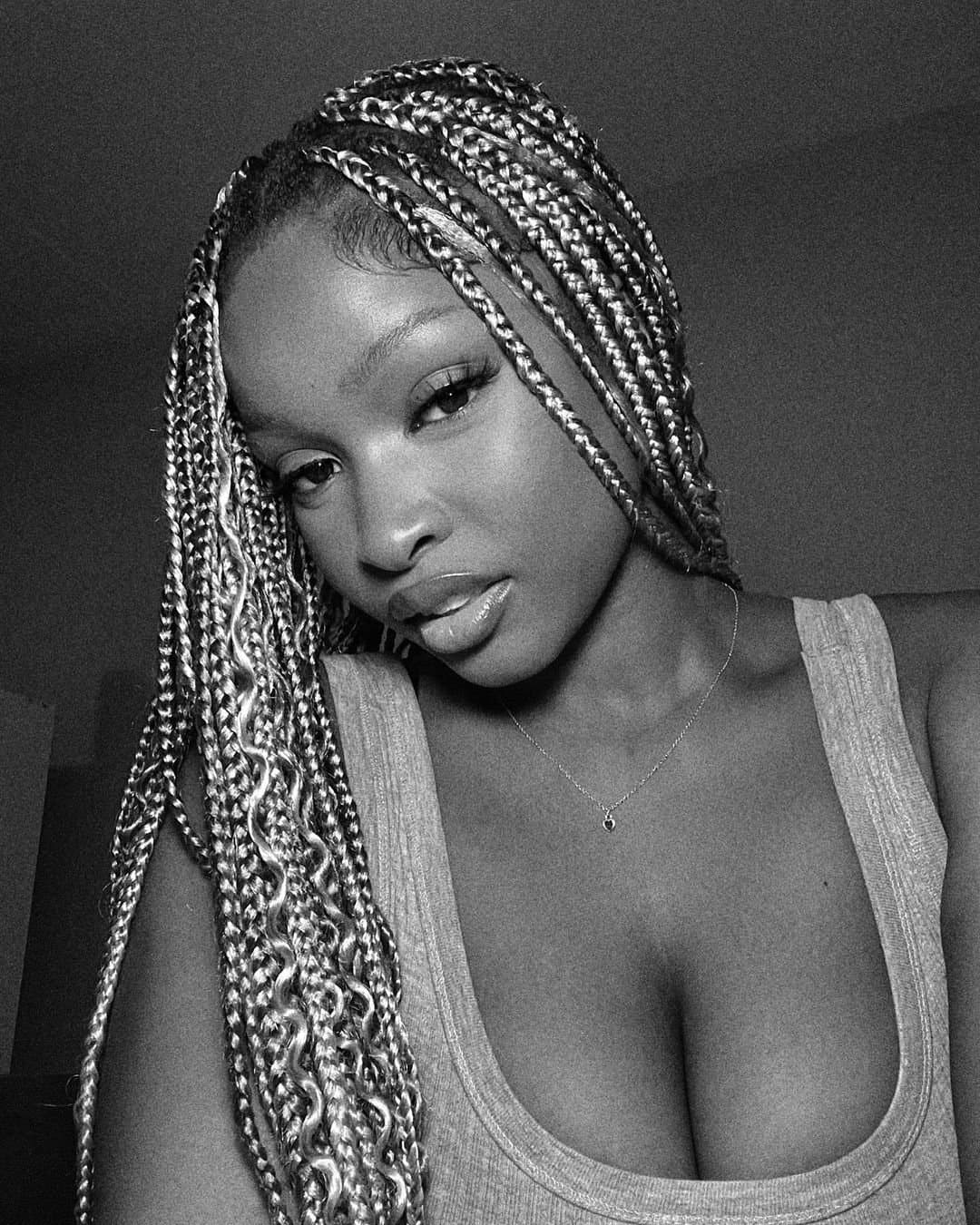 Ebony teen seducing with her big boobs