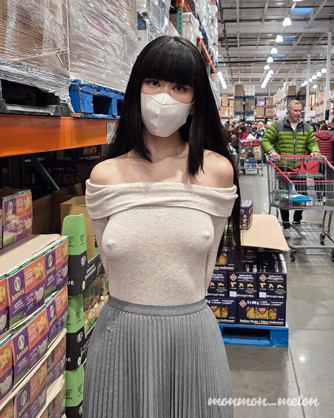 Some busty pierced braless woman ???