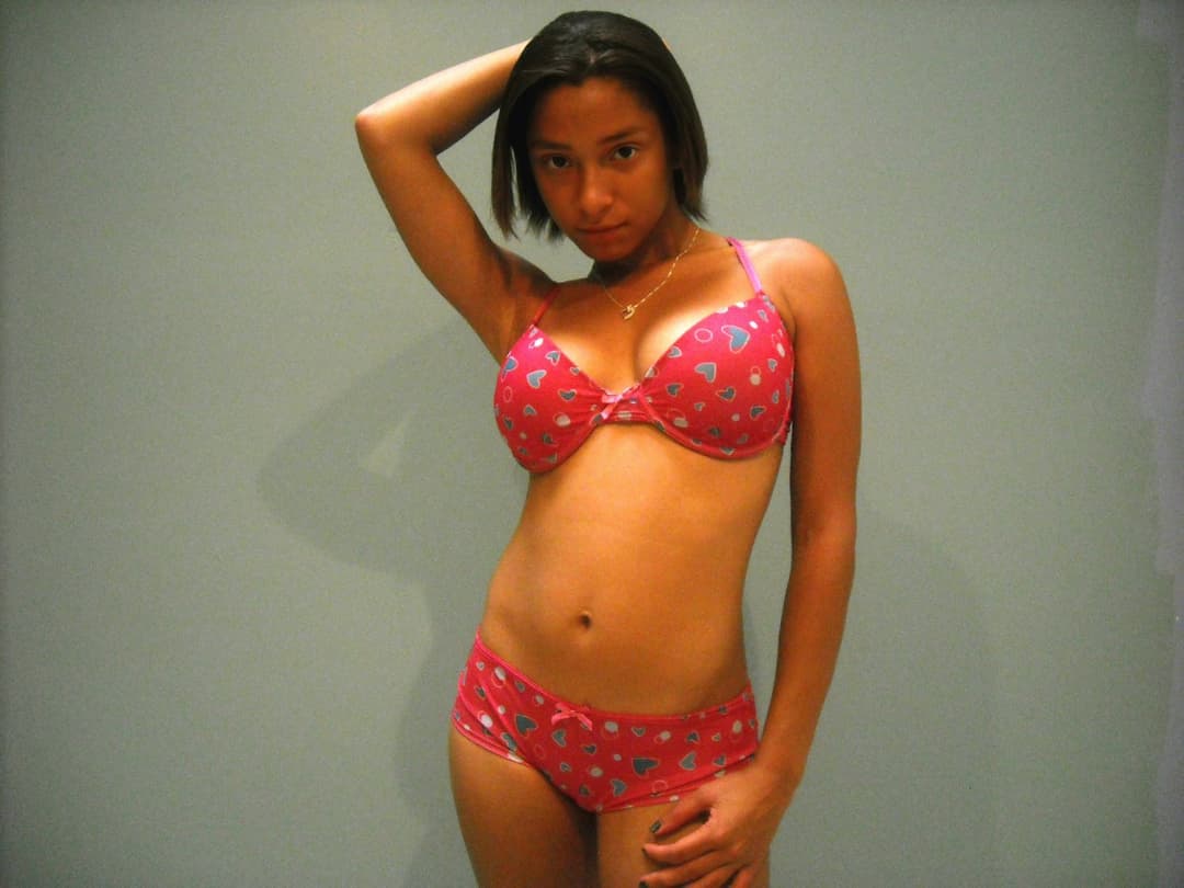 Teen Rican with a tight little body.