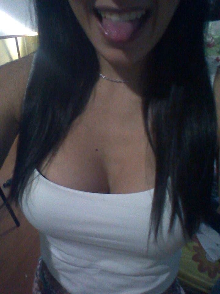 Brunette slut fake tits pretty smile