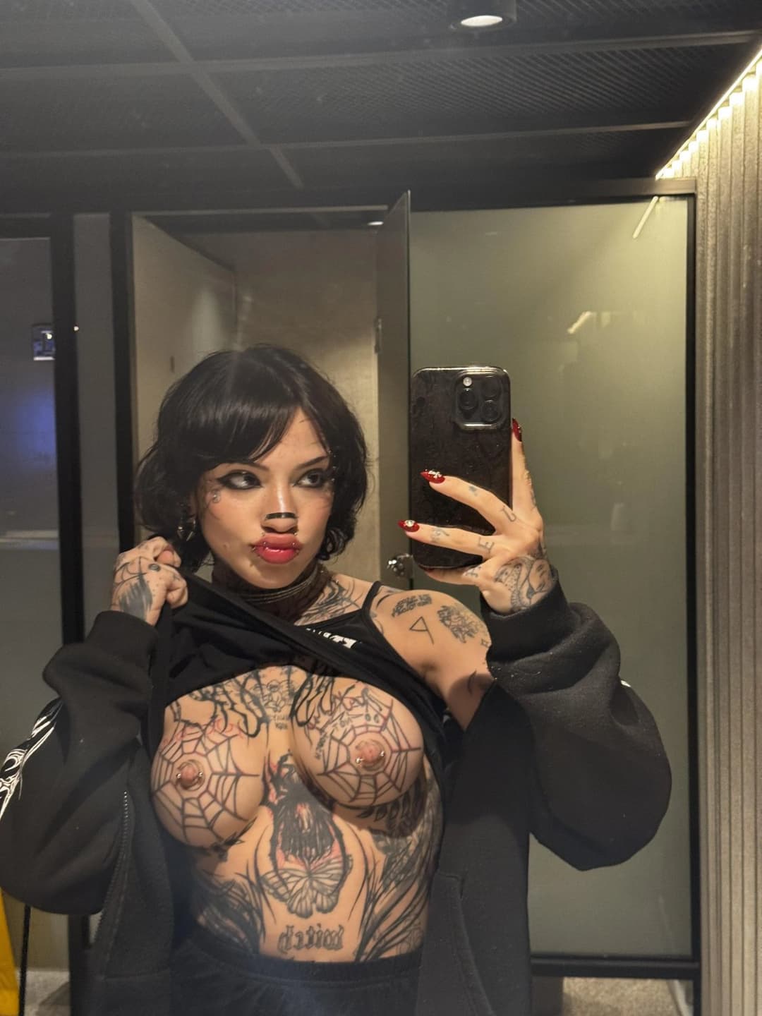 Heavily tattooed goth