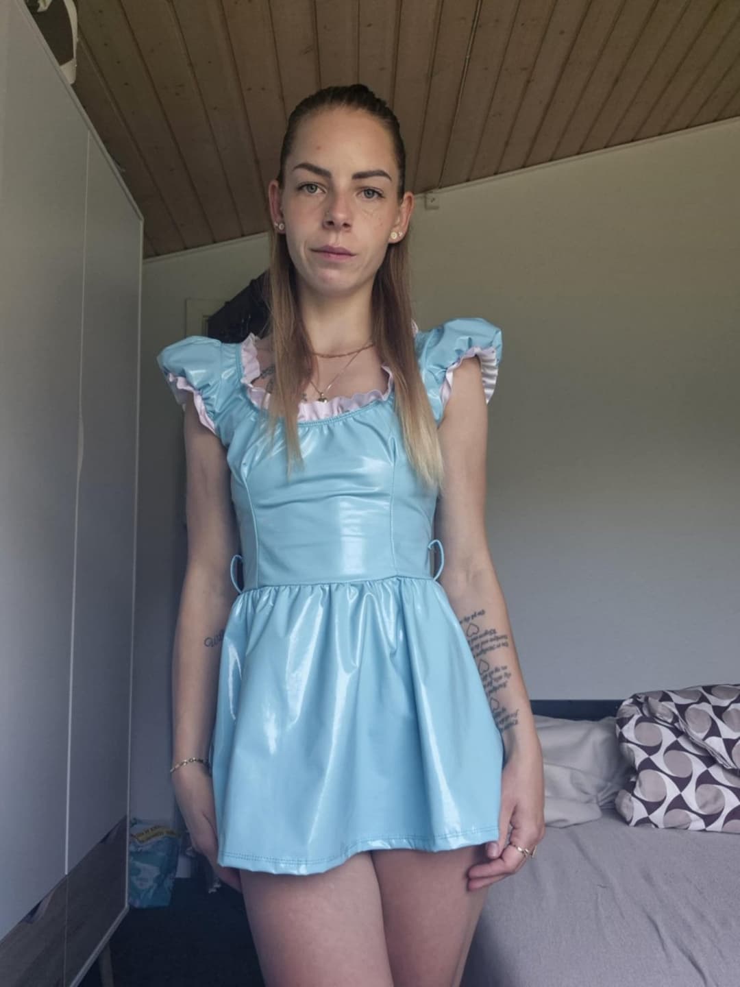GF in baby blue vinyl dress