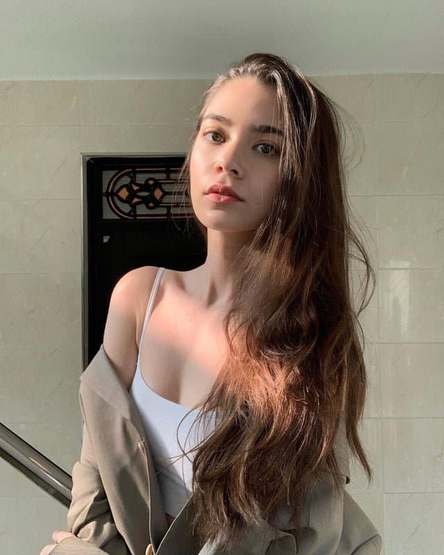 Mixed German-Korean model MELODI FLACK deserves your baby oil covering her pretty face