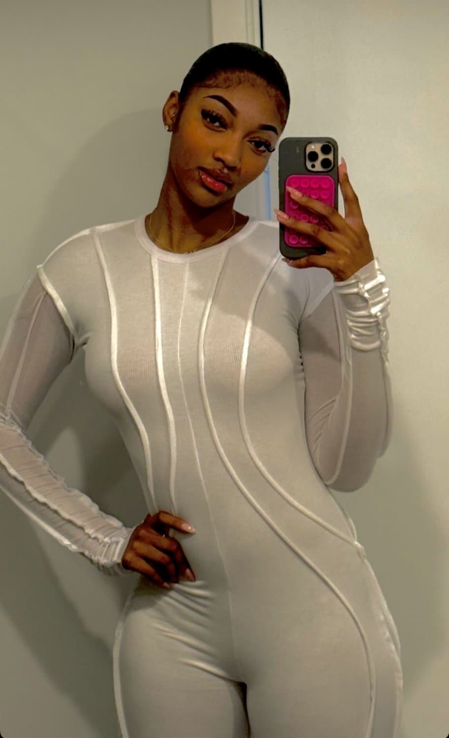 Click to view full size Nigga Angel Reese doesn’t wanna be sexualized but continues to dress like a fucking whore..