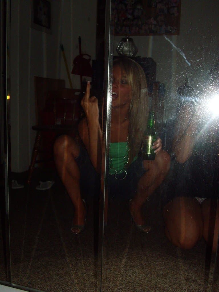 Sorority girls pre-game drink in the dorm room