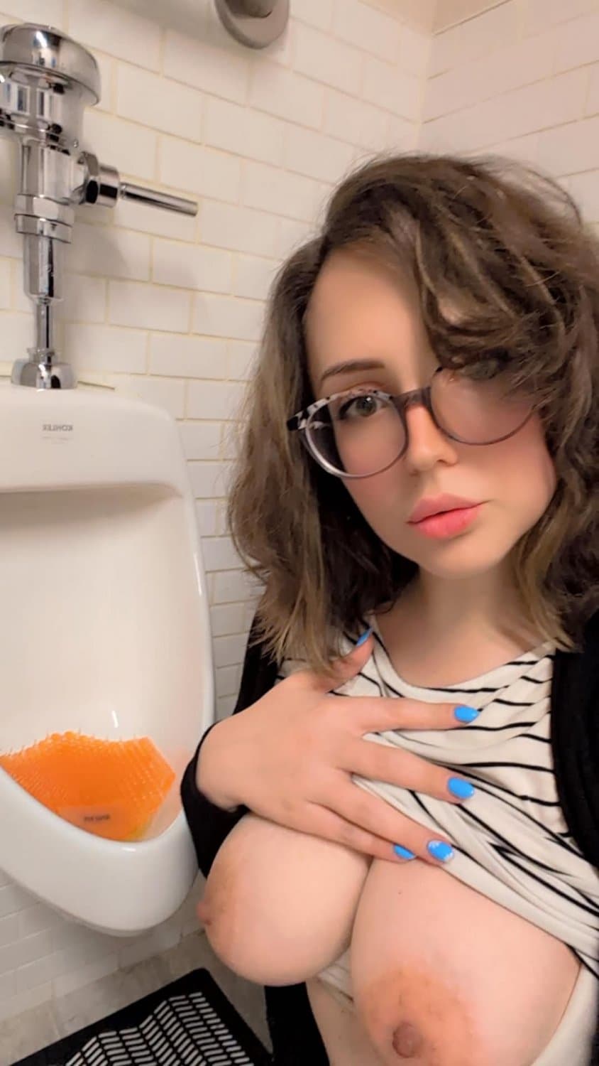humiliated dumb slut licks urinal