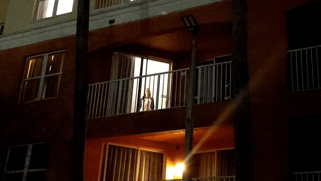 Exhibitionist slut caught showing off in hotel window