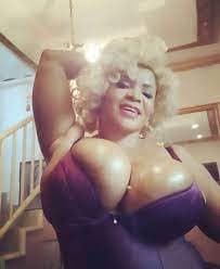 Big Breasted Nigerian MILF