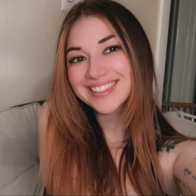 Click to view full size Hottest Milf ever? This curvy slut who loves sticking her tongue out comes damn close