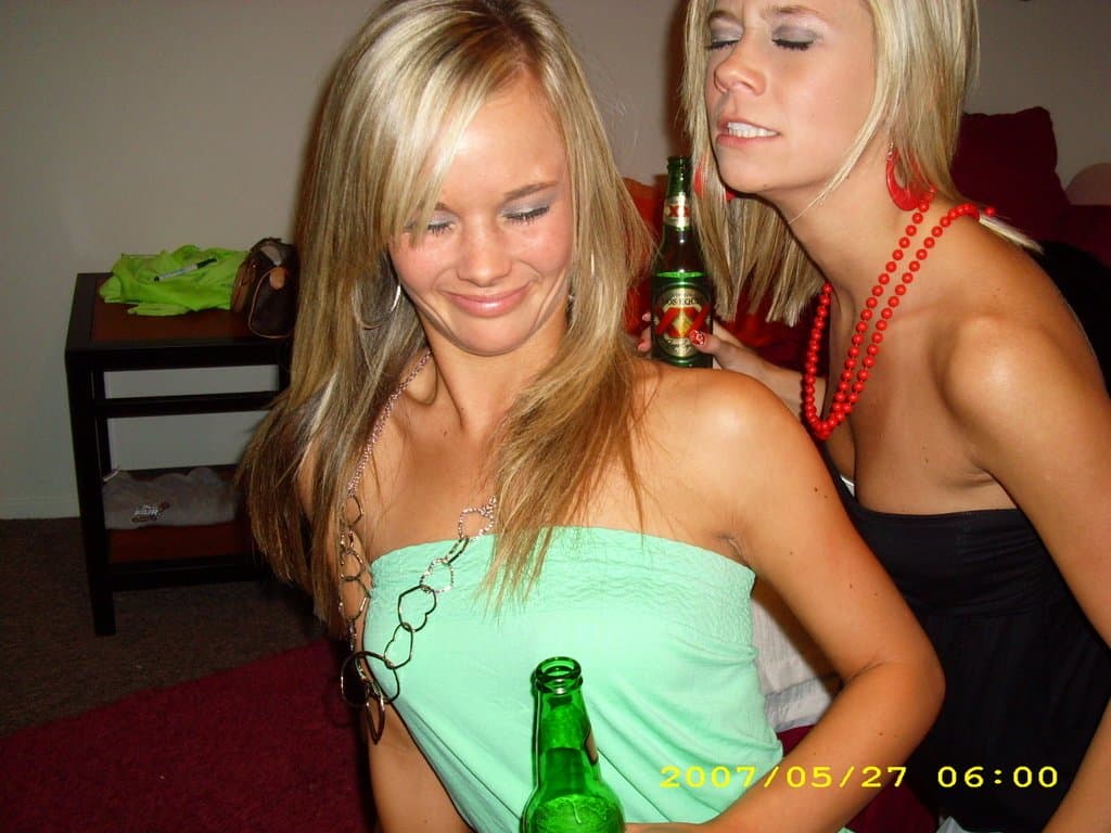 Sorority girls pre-game drink in the dorm room