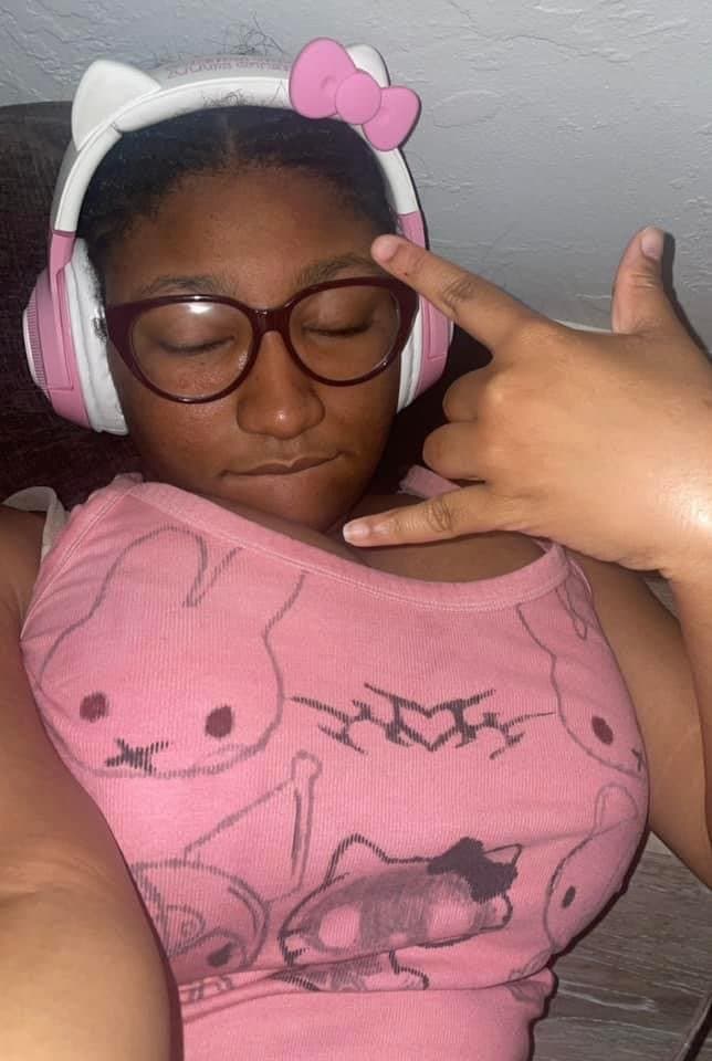 Black girl with big tits and hello kitty headphones