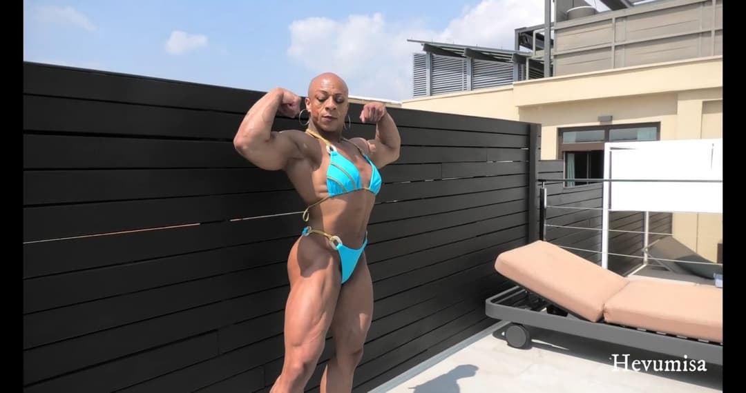 Mrs Menage, just smelling her own roided muscles gives her a powerful orgasm