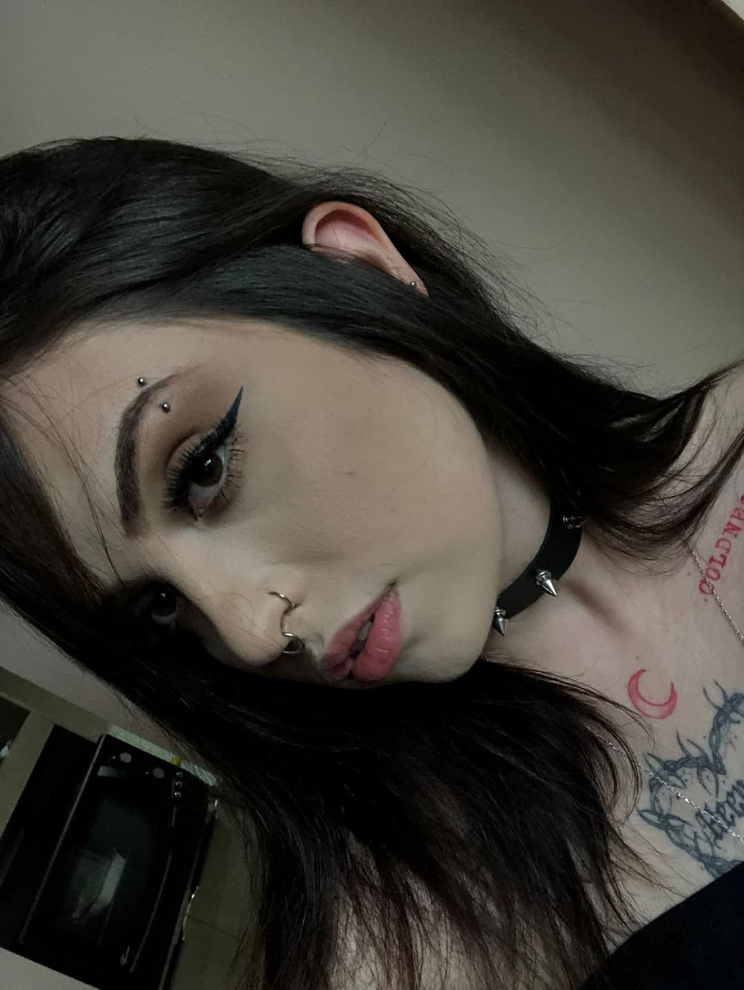 Gothic teen in doggy position