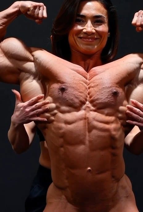 And a naked bodybuilder really loves her roided muscles to be worshipped by girls