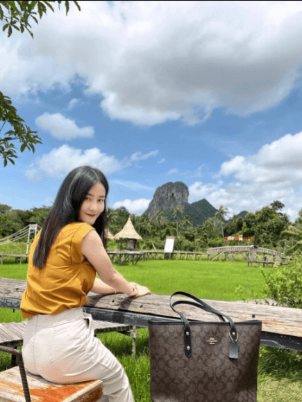 Her husband wants us to see her beautiful figure.