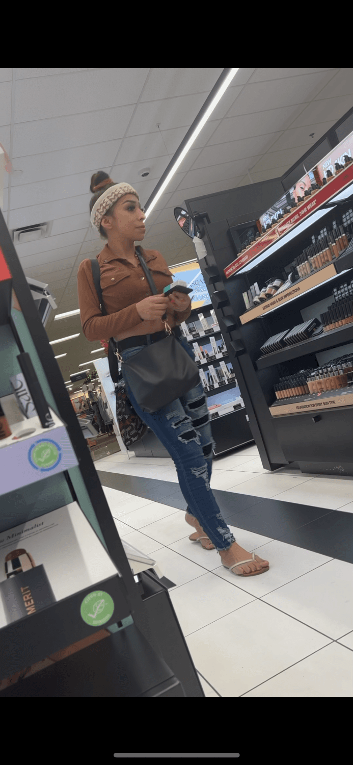 Candid busty shoplifting Latina with perfect feet and body