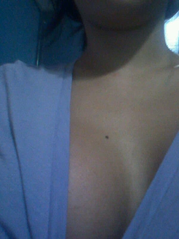 Brunette slut fake tits pretty smile