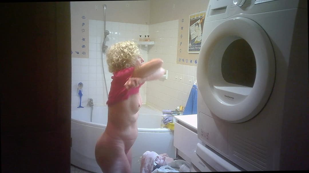 Two hidden cams for nurse Solange braless