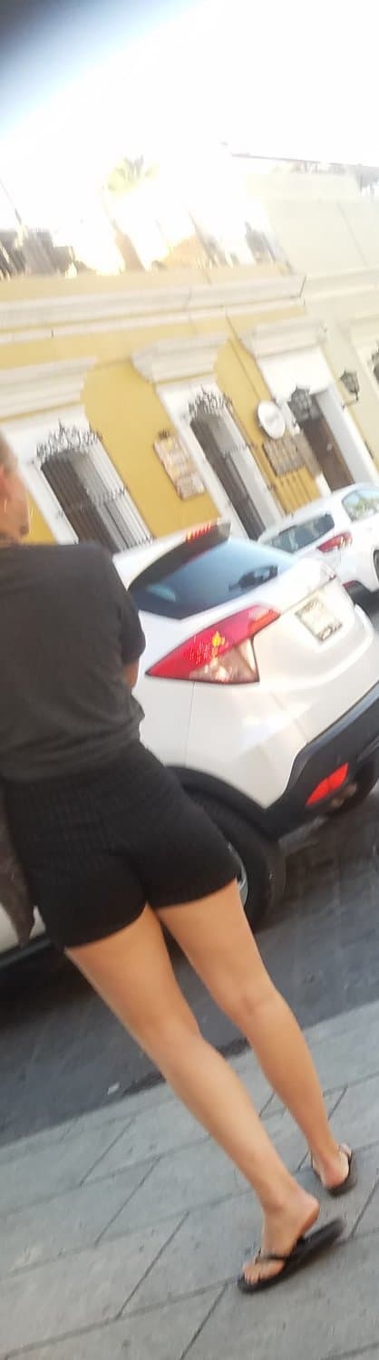 2 friends, blonde and brunette, in shorts, nice legs