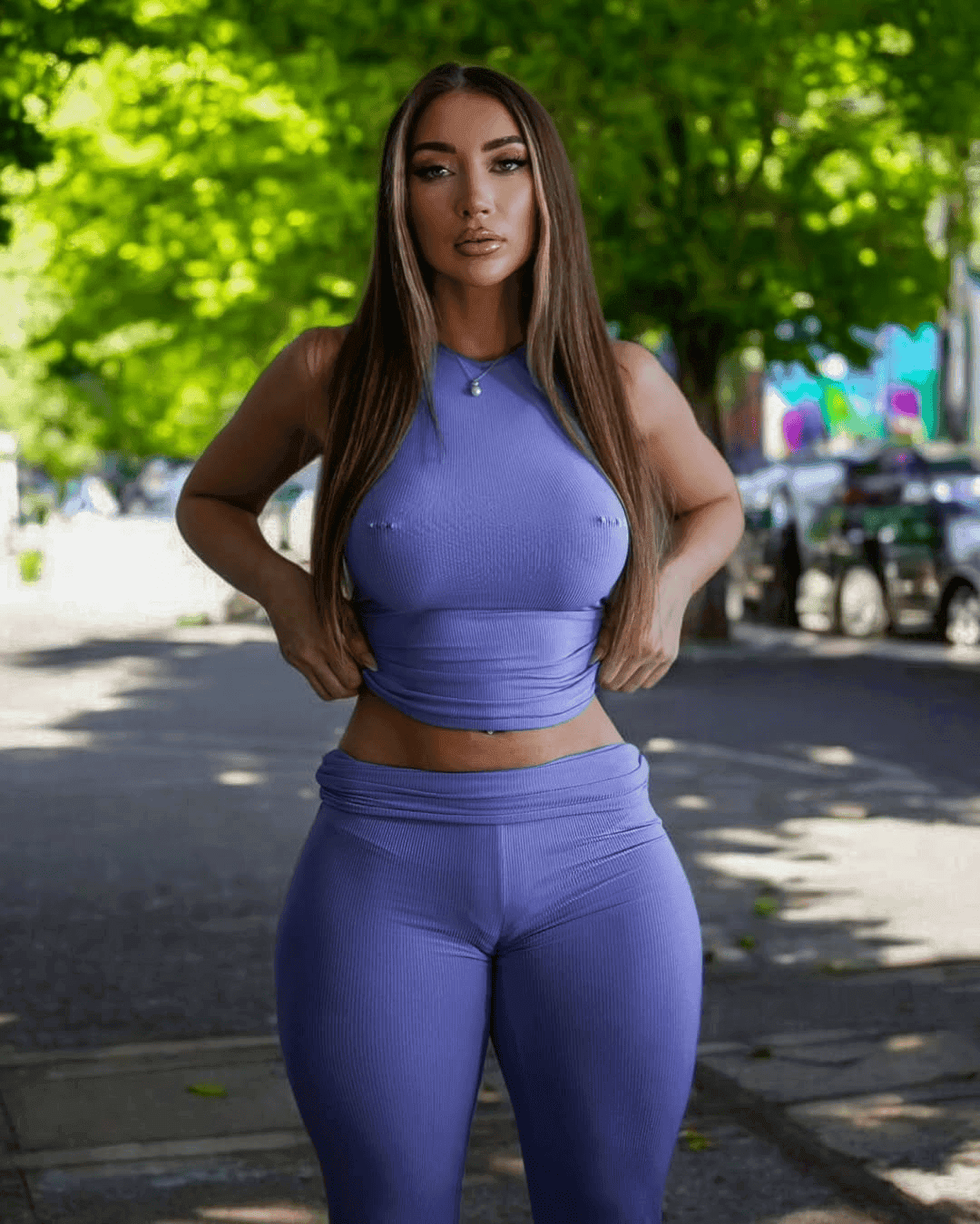 Some busty pierced braless woman ???