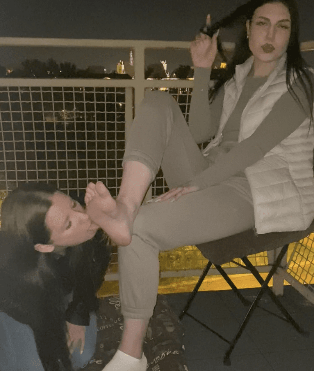 Foot Queen makes Slave Worship Feet on Balcony
