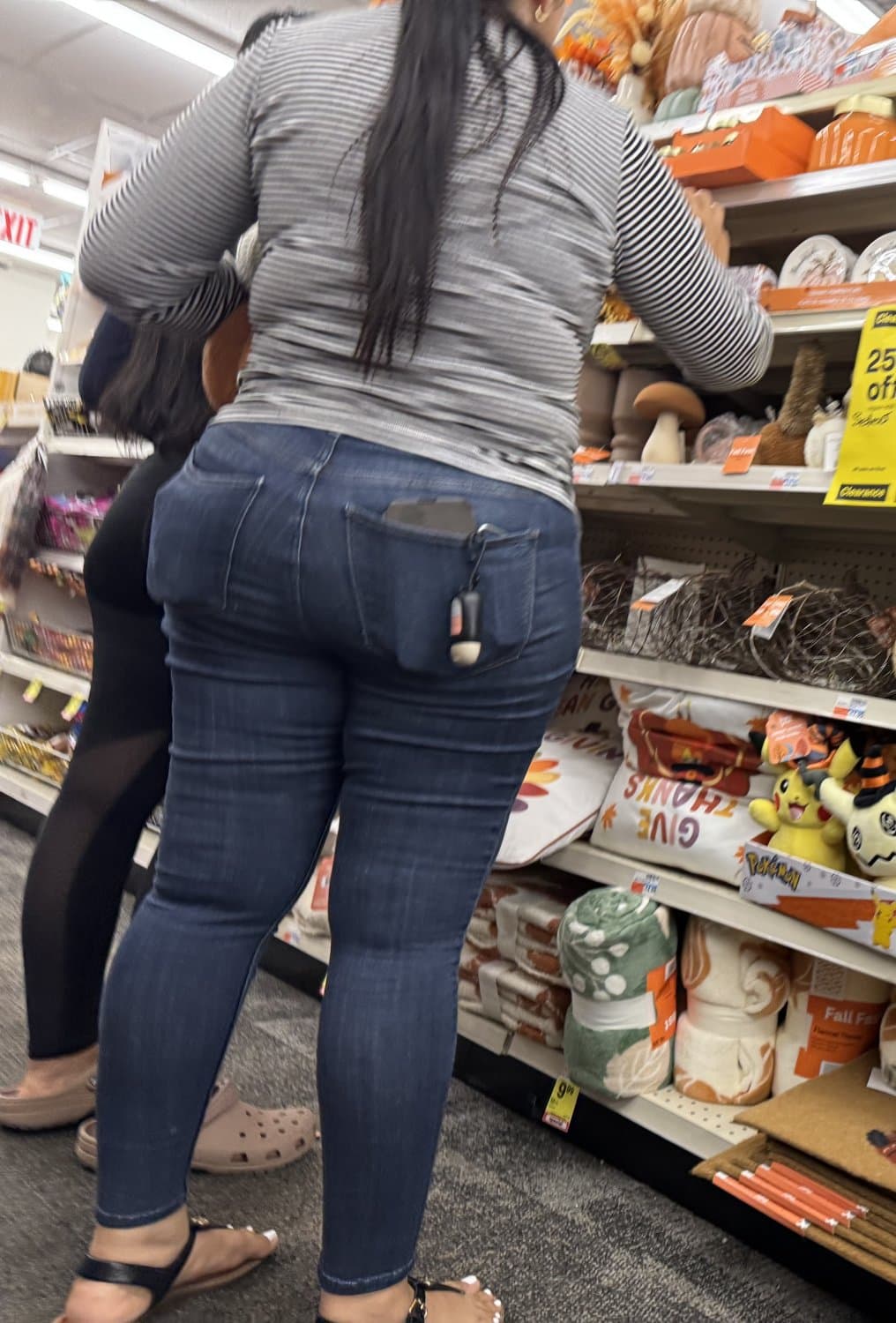 Mother in blue jeans  & Daughter in black tights.