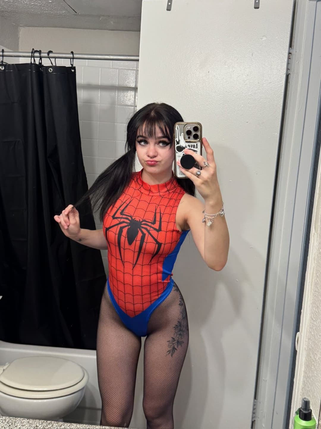 Spider-Girl doesn’t swing… she teases