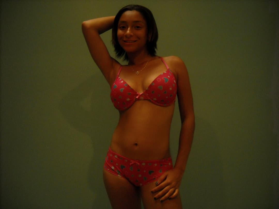 Teen Rican with a tight little body.