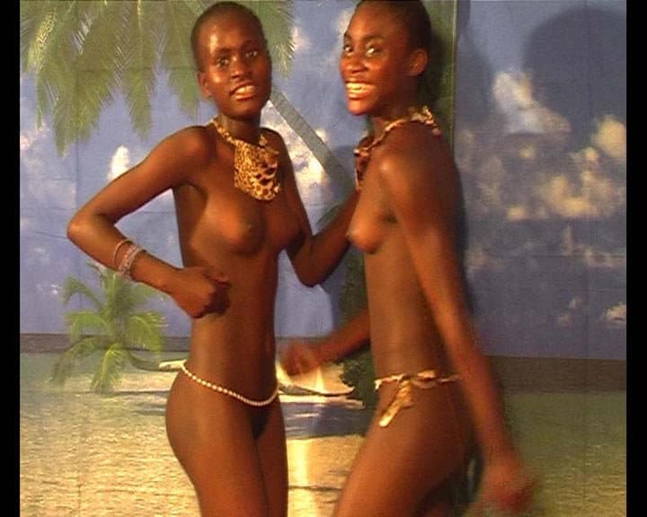 Cocoa-brown women dance naked