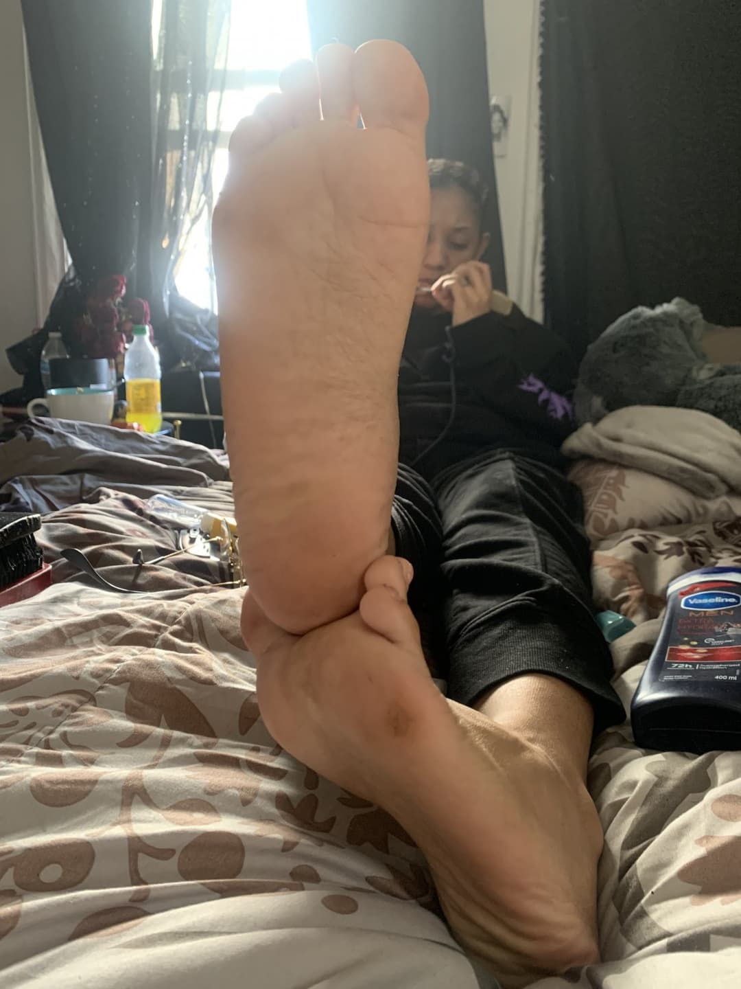 Sunlight hitting them big ass feet just right