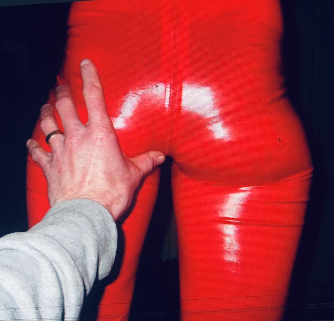 English milf in red pvc cat suit and black high heels  . uk milf in  Black lace panties pussy play