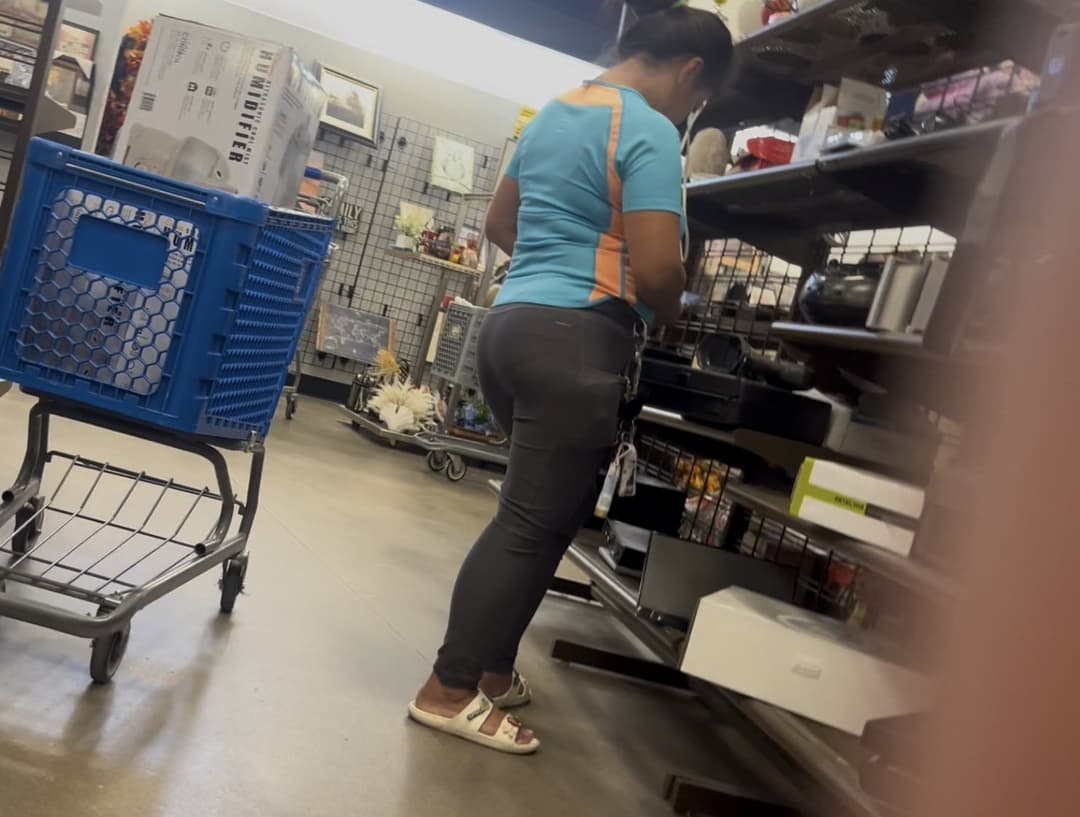 MILF shopping knew I was creeping. Started bending over for me to capture.