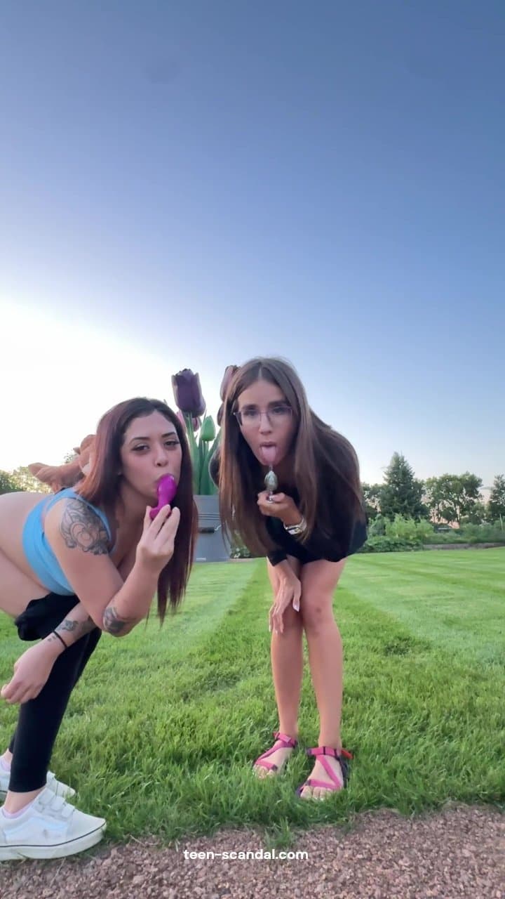 Licking each others butt plugs (1)