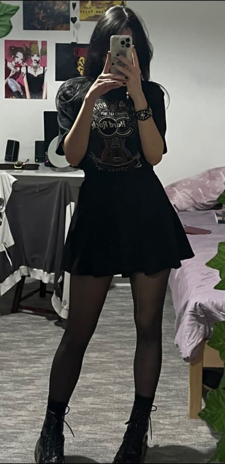 Sexy long legs alt girl in short skirt