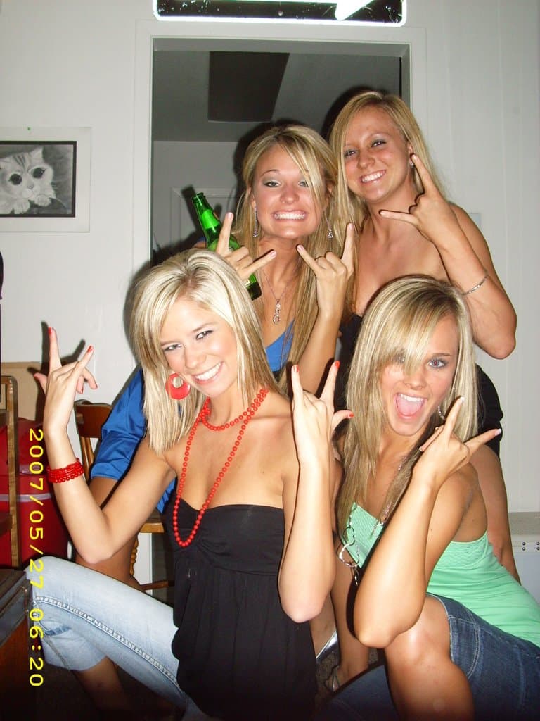 Sorority girls pre-game drink in the dorm room