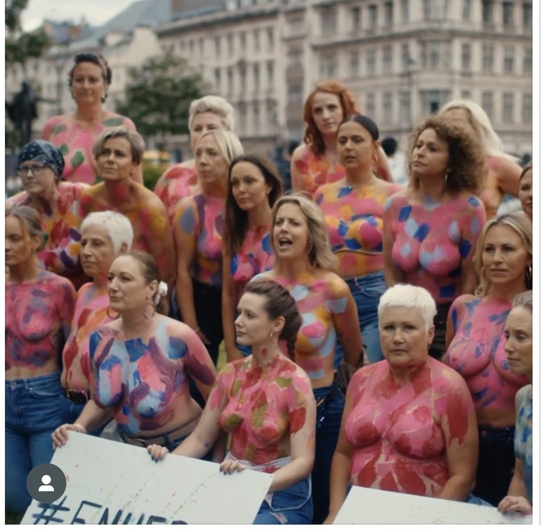 Click to view full size Sophie and friends topless cancer protest