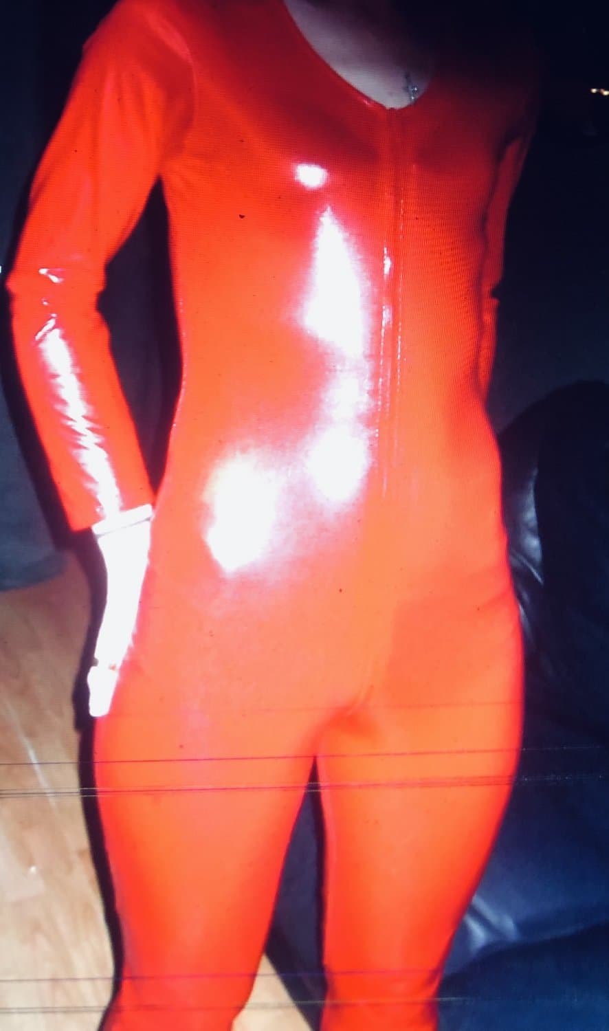English petite biker milf in red pvc catsuit strips naked again tattoos and pierced nipples