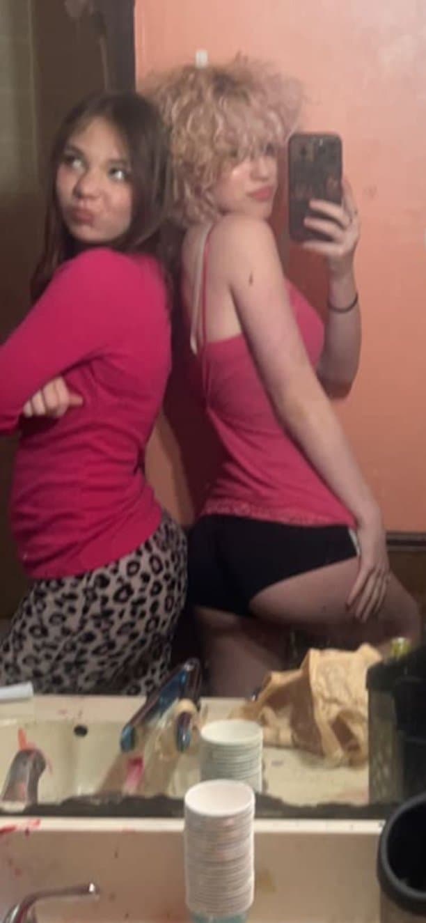 pink haired emo girl arches and shows ass