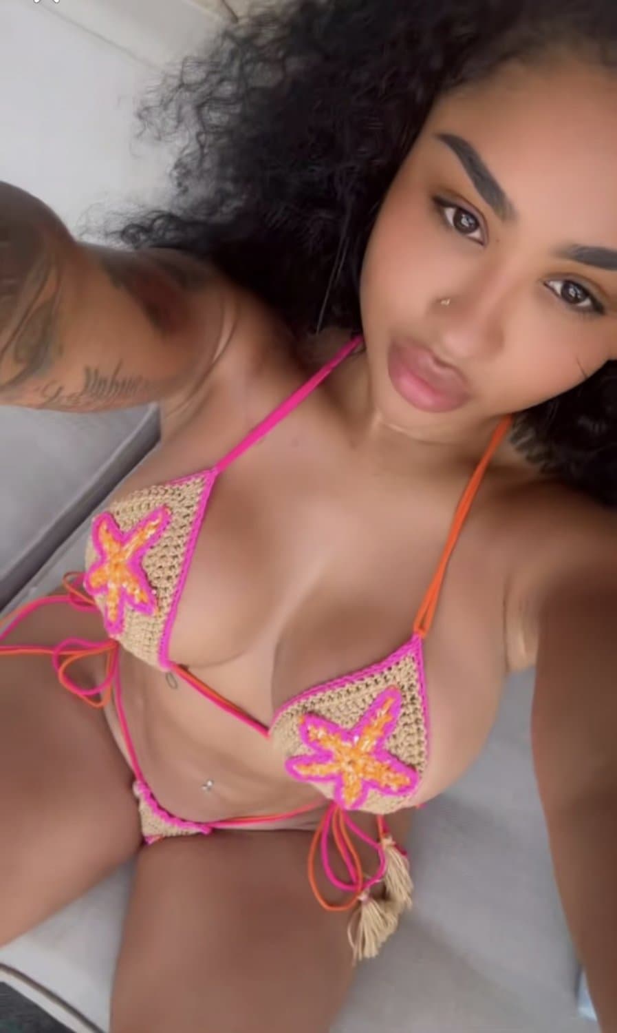 ari fletcher tits busting out bikinis